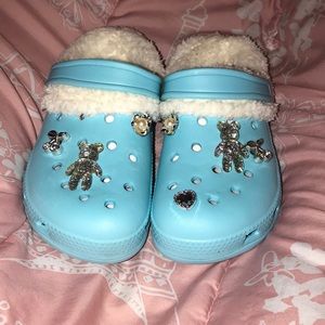 Light blue crocs with fur inside